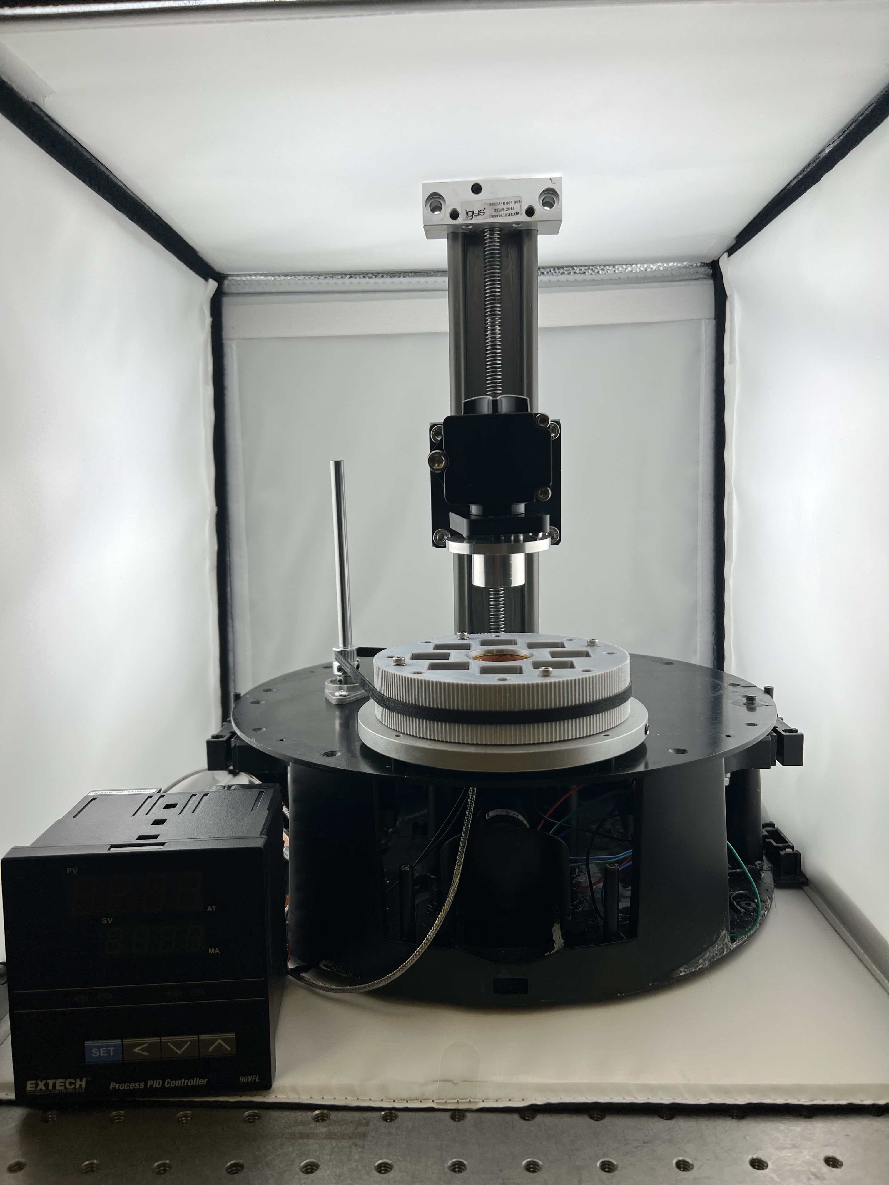 The Magprint prototype, with a circular rotating magnetic array around the build region of an Autodesk Ember printer.